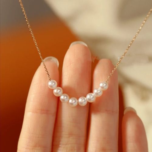 Golden Pearl Pendant Necklace