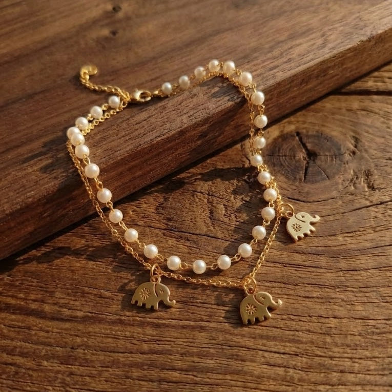 White Pearls With Elephant Charm Bracelet