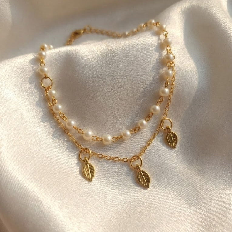 White Pearls Bracelet with Little Leaf Charm