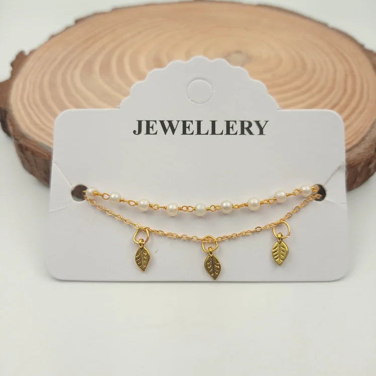 White Pearls Bracelet with Little Leaf Charm